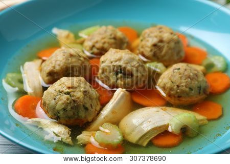Tasty Jewish Matzoh Balls Soup In Bowl, Closeup