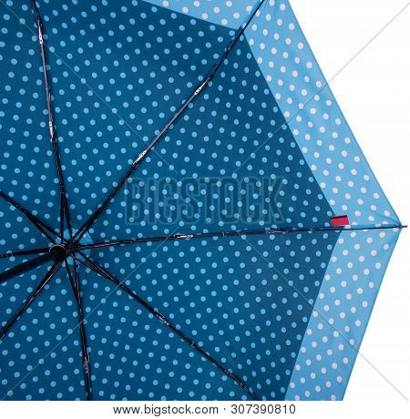 Underside Of Steelblue Color Dotted Umbrella With Eight Ribs Isolated On White Background. Bottom Vi
