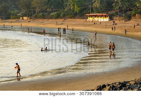 Om Beach,gokarna,karnataka/india-february 2nd, 2018:viewed From A Hilltop,people Playing And Relaxin