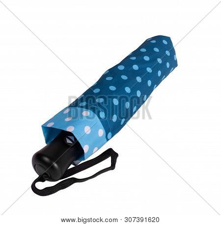 Folded Compact Umbrella In Dotted Steelblue Color Cover Isolated On White Background