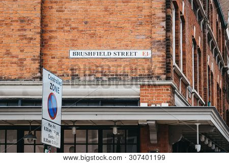 London, Uk - June 15, 2019: Brushfield Street Name Sign On A Wall Of Spitalfields Market, One Of The