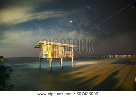 Old Wooden House, No Longer Living In The Sea, No Way Up The House Taken With The Milky Way As The B