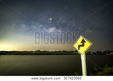 Signs, Signs, Beware Of Curves At Night, Behind The Sign, With The Milky Way..
