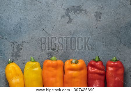 Ripe Colorful Ramiro Peppers On Stone Background, Copy Space