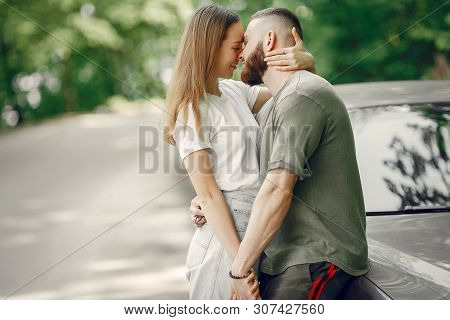 Beautiful Couple Spend Time On A Summer Forest