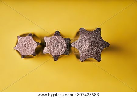Three Torx Bits For The Screwdriver On A Yellow Background. Top View.