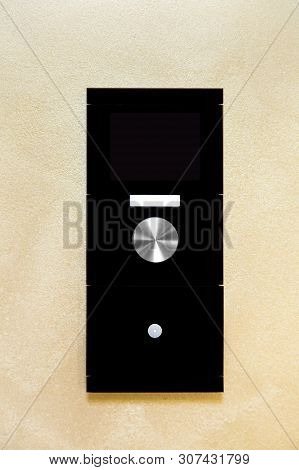 Smart Home Control Controller With A Screen And Buttons To Control The Light And Temperature In The 