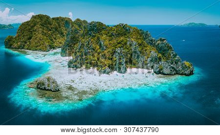 Aerial Drone View Of Tropical Shimizu Island And Pristine Beach In Blue Ocean El Nido, Palawan, Phil