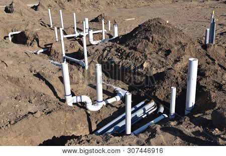 Pvc Pipe Is Installed And Buried Under The Ground Prior To The Cement Floor Being Poured On A New Co