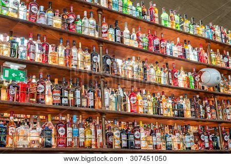 Paris, France - April 15, 2019 : Large Collection Of Alcohol Bottles On Shelves In La Felicita Bar-r