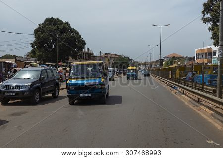Bissau, Republic Of Guinea-bissau - February 8, 2018: Street Scene In The City Of Bissau With Public