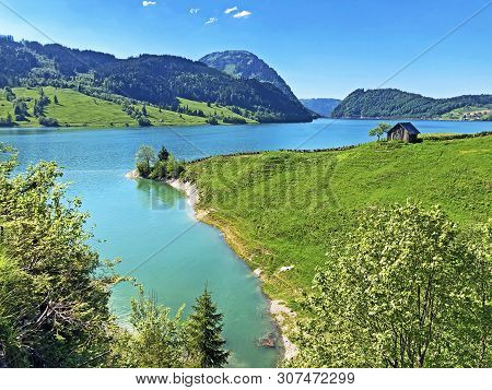 Traditional Architecture And Farmhouse In The Valley Of Wagital Or Waegital And By The Alpine Lake W
