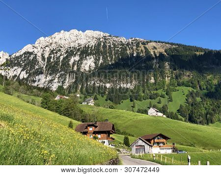 Traditional Architecture And Farmhouse In The Valley Of Wagital Or Waegital And By The Alpine Lake W