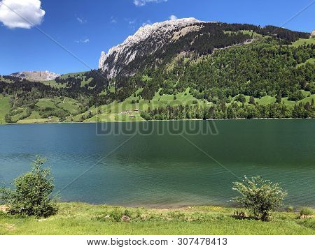 The Schiberg Mountain Above The Wagital Valley Or Waegital And The Wagitalersee Alpine Lake (waegita
