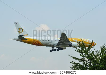 Airplane Landing At Bangkok Airport