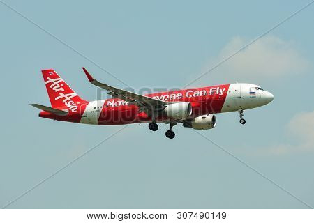 Airplane Landing At Bangkok Airport