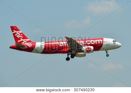 Airplane Landing At Bangkok Airport