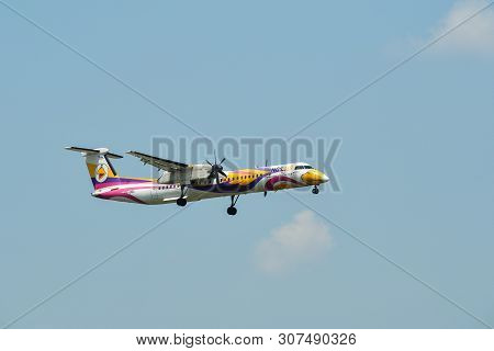 Airplane Landing At Bangkok Airport