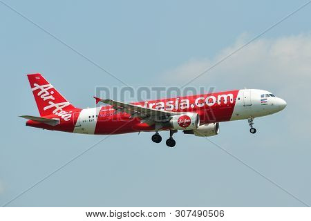 Airplane Landing At Bangkok Airport