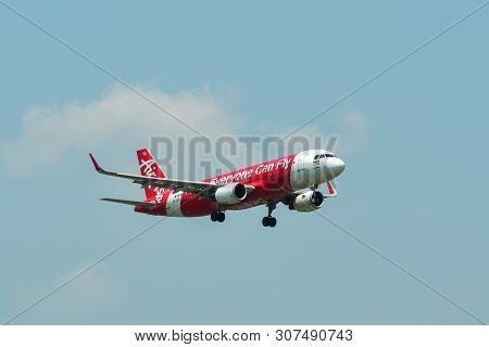 Airplane Landing At Bangkok Airport