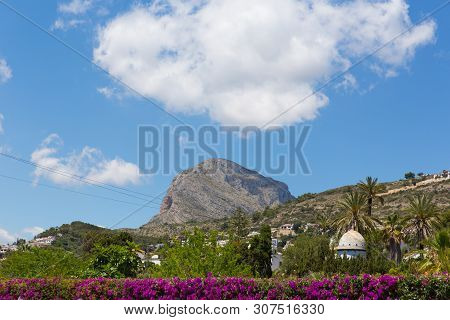 Xabia Spain View From Town To The Mountain Including Beautiful Bougainvillea Flowers In Summer