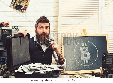 Beyond His Wildest Imagination. Bearded Hipster With Bitcoin Symbol And Dollars. Business Man In Ser