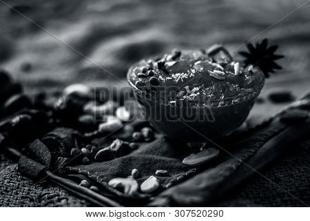 Famous Mango Preservation I.e. Murba Or Murabba In A Glass Bowl On Jute Bag's Surface Along With Dry