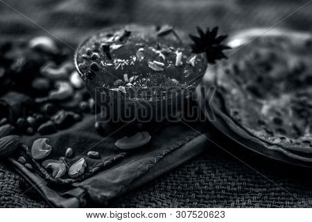 Famous Mango Preservation I.e. Murba Or Murabba In A Glass Bowl On Jute Bag's Surface Along With Dry