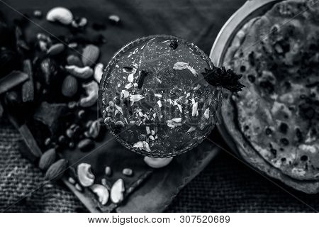 Famous Mango Preservation I.e. Murba Or Murabba In A Glass Bowl On Jute Bag's Surface Along With Dry
