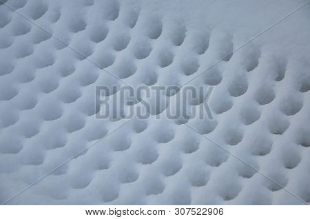 The Snow-covered Grid Formed An Abstract Pattern.