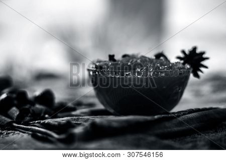 Famous Indian Dessert And Sweet Dish In A Glass Bowl On Jute Bags Surface I.e. Murabba Or Murba Alon
