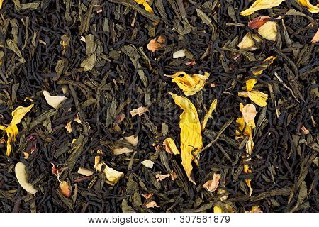Autumn Extravaganza Tea. Mix Of Ceylon Black Tea, Sencha, Sunflower, Rose, Almond Flakes.