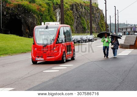 Oslo, Norway - June 20, 2019: One Red Public Transportation Nquyq Self-driving Electric Bus In Servi