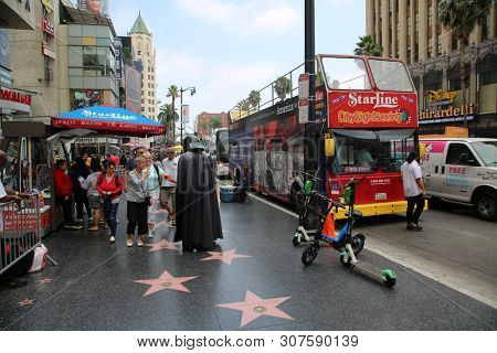 6/18/2019 Hollywood: California:  Tourist Visit Hollywood and enjoy sights, sounds, and smells of street performers and homeless alike on the streets of Hollywood in Los Angeles California. Editorial 