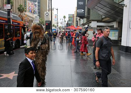 6/18/2019 Hollywood: California:  Tourist Visit Hollywood and enjoy sights, sounds, and smells of street performers and homeless alike on the streets of Hollywood in Los Angeles California. Editorial 