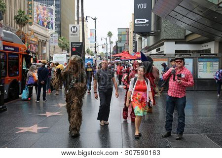 6/18/2019 Hollywood: California:  Tourist Visit Hollywood and enjoy sights, sounds, and smells of street performers and homeless alike on the streets of Hollywood in Los Angeles California. Editorial 