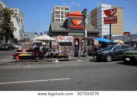 6/18/2019 Hollywood, California: Street Scenes of Hollywood California with street vendors, street performers, homeless, tourist, landmarks and various buildings with signs. Editorial Use Only. 