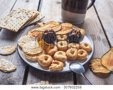 A Quick Lunch With Cereal Biscuits And Dried Fruit Chips