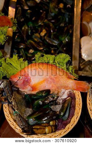 Fresh Seafood Lies On The Counter. Exotic Food On The Thailand Market.