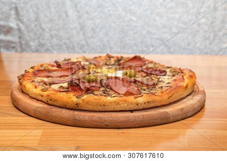 Traditional Pizza With Proscuitto And Egg Italian Cuisine