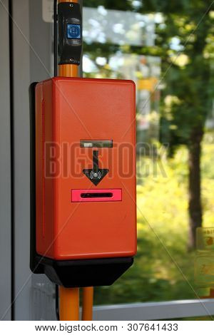 Orange Ticket Validator In A Dresden Tram