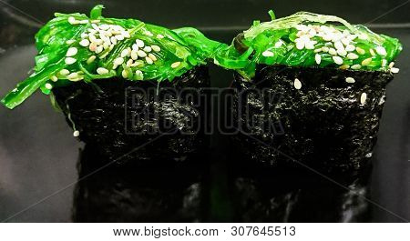 Vegetarian Sushi Concept. Two Gunkans With Chuka And Sesame