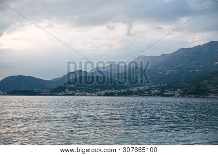 Beautiful Views Of The Mountains, The Sea And The City Of Budva In Montenegro. The City Is Among The