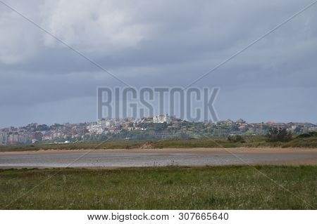 Beautiful Views Of The Buildings Of The Old Town Of Santander City From The Beach In Pedrena. August