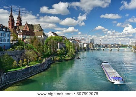 Old Town Grossbasel With Basler Muenster Cathedral On The Banks Of The Rhine River On A Sunny Spring