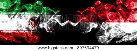 Iran Vs Monaco, Monacan Smoky Mystic States Flags Placed Side By Side. Thick Colored Silky Smokes Fl