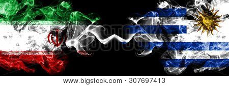 Iran Vs Uruguay, Uruguayan Smoky Mystic States Flags Placed Side By Side. Thick Colored Silky Smokes