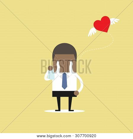 African Businessman Crying Broken Heart With Heart Flying Away.