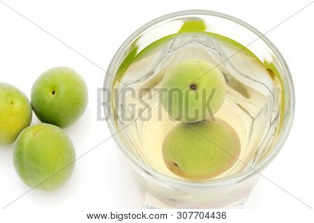Japanese Plum Wine Called Umeshu On White Background
