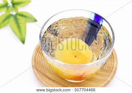 Japanese Plum Wine Called Umeshu On White Background